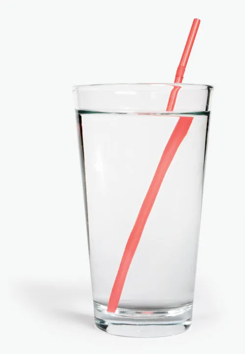 A straw in a glass of water